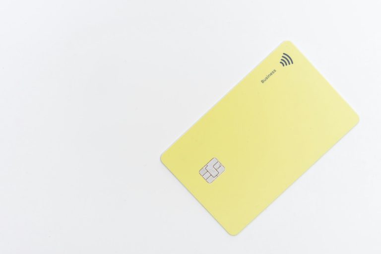 yellow square card on white surface